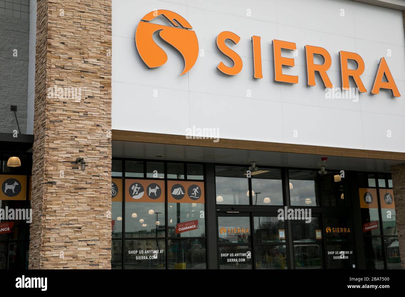 A logo sign outside of a Sierra retail store location in East Hanover