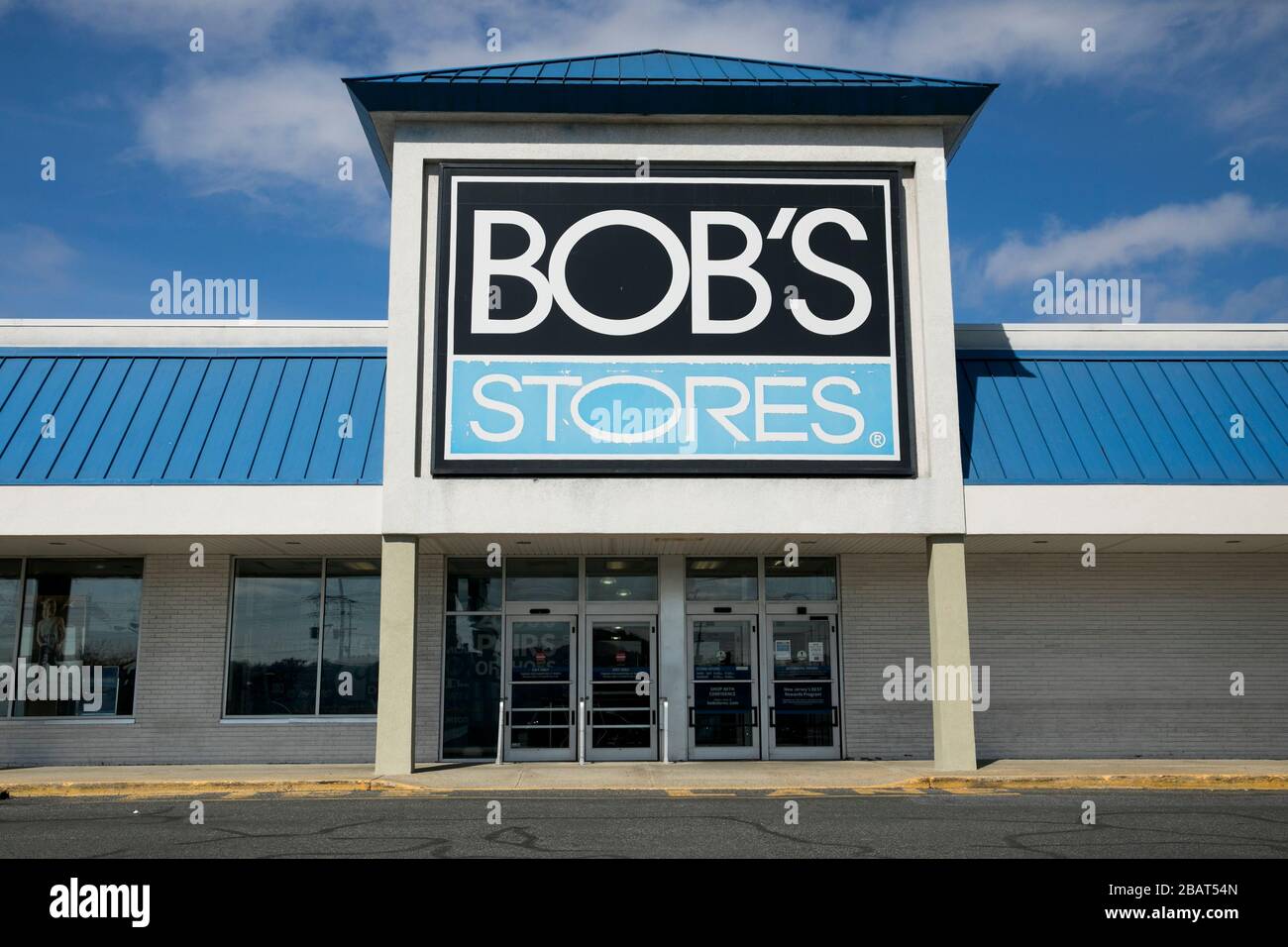 A logo sign outside of a Bob's Stores retail store location in Totowa