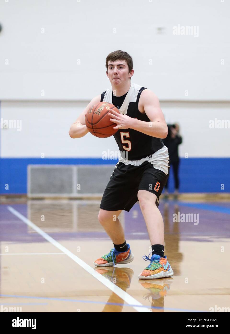Basketball action with Odessa vs Valley Christian HIgh School in