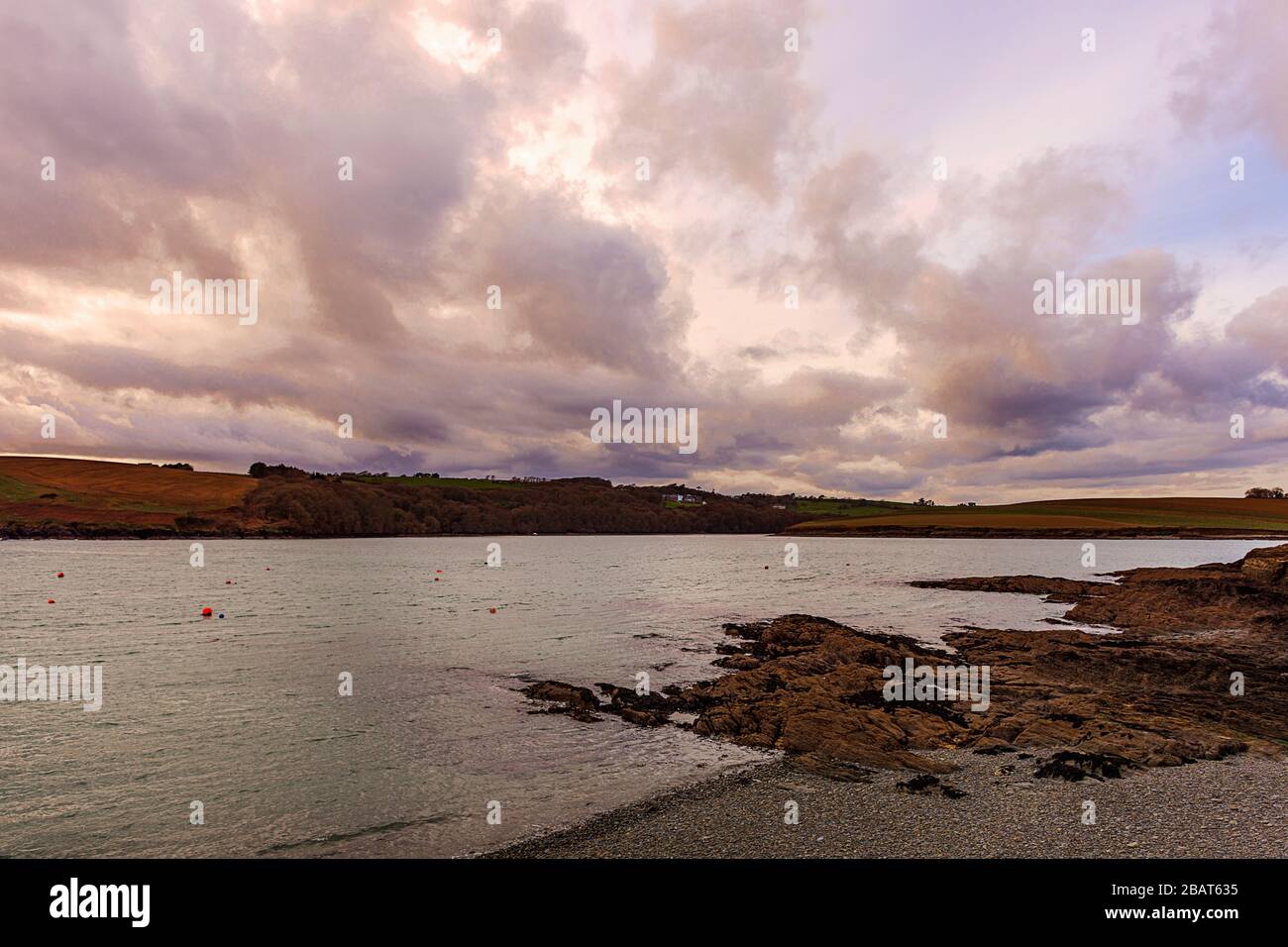 Irish landscape. Ireland. Oysterhaven beach. Kinsale. Cork. Cloudscape at sunset. Stock Photo