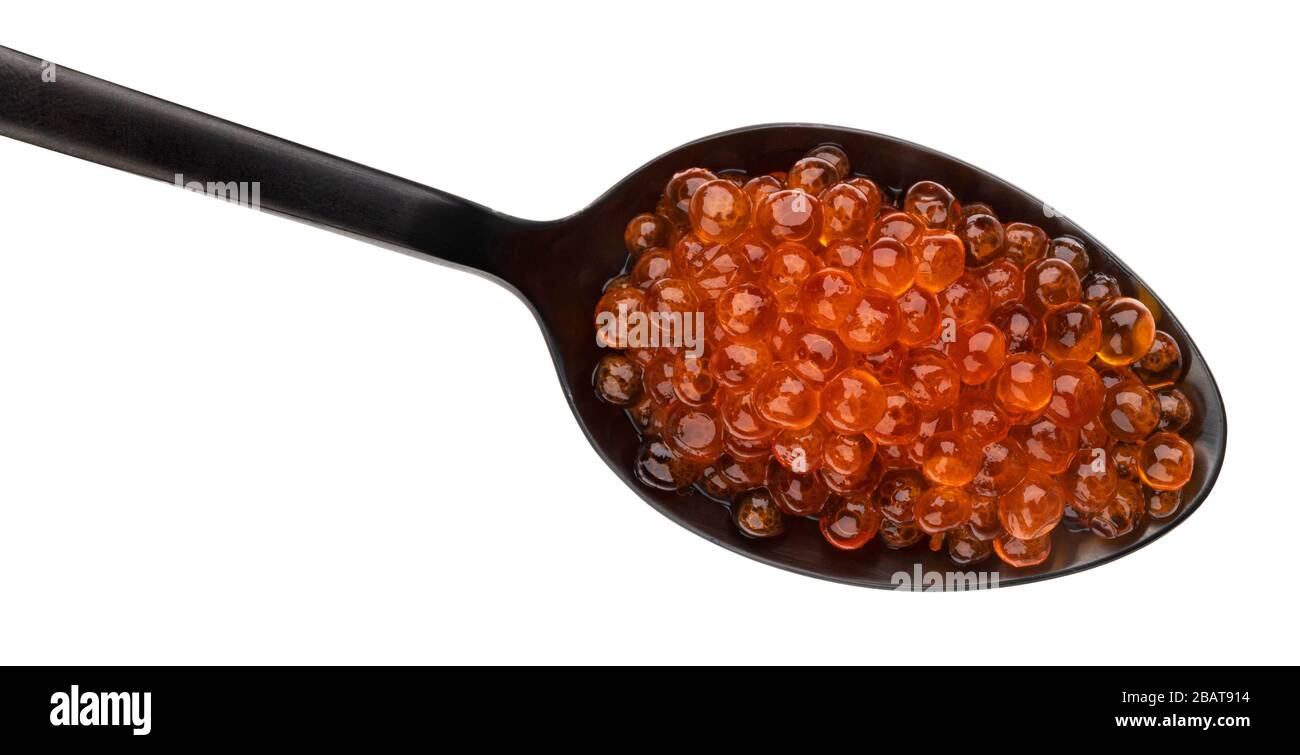 Red caviar in black spoon isolated on white background Stock Photo