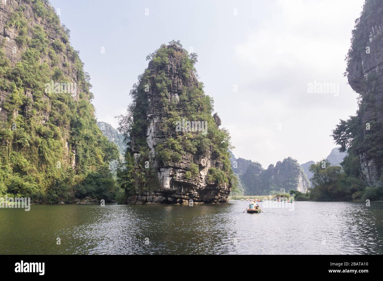 Vietnam Trang An Landscape - Limestone (karst) massifs of Trang An in the Red River Delta in Ninh Binh Province of North Vietnam, Southeast Asia. Stock Photo