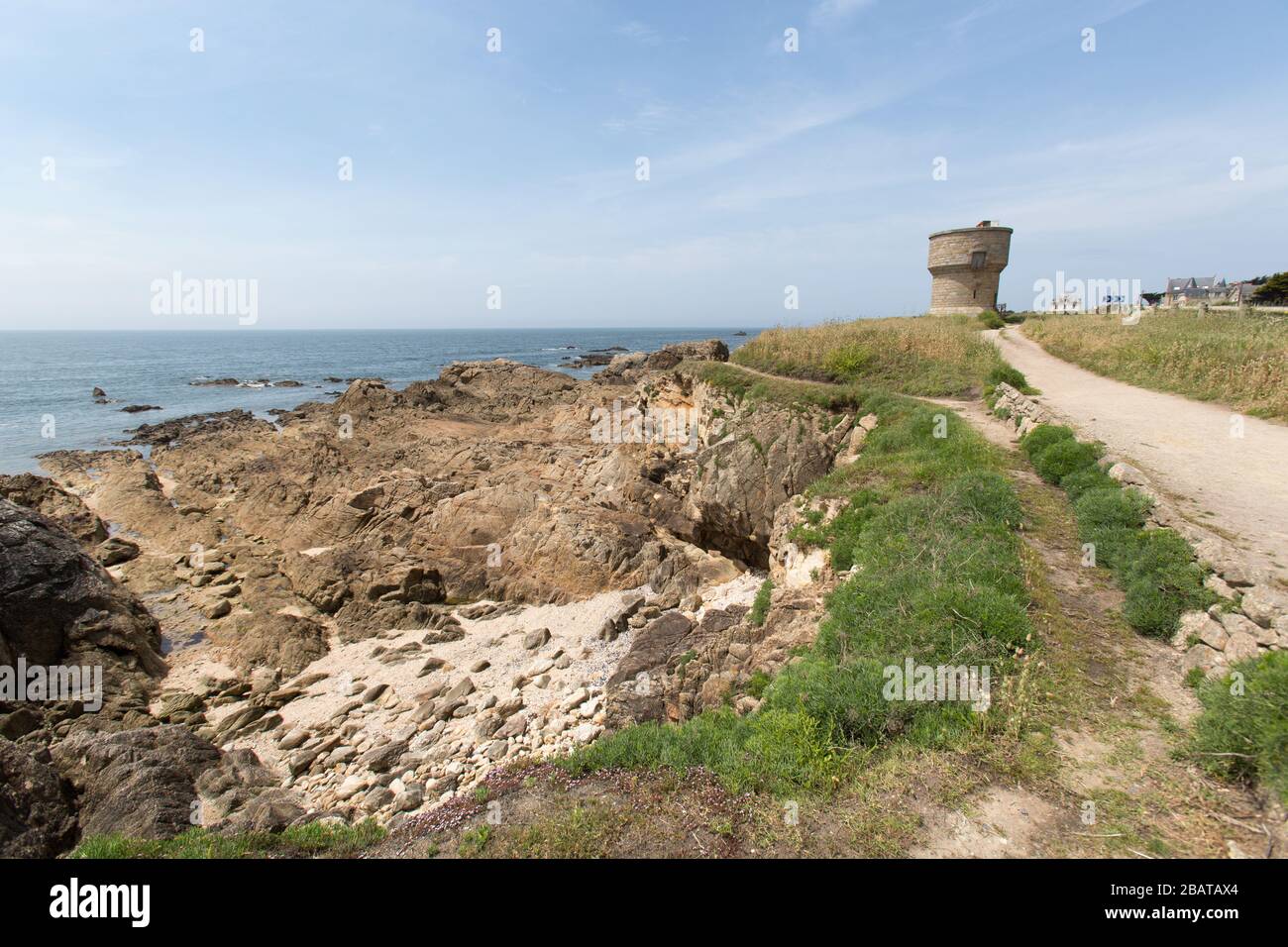 Le Croisic, France. Picturesque view of Le Croisic’s southern coastline with the historic Moulin de Penn Avel (Penn Avel's Mill) in the background. Stock Photo