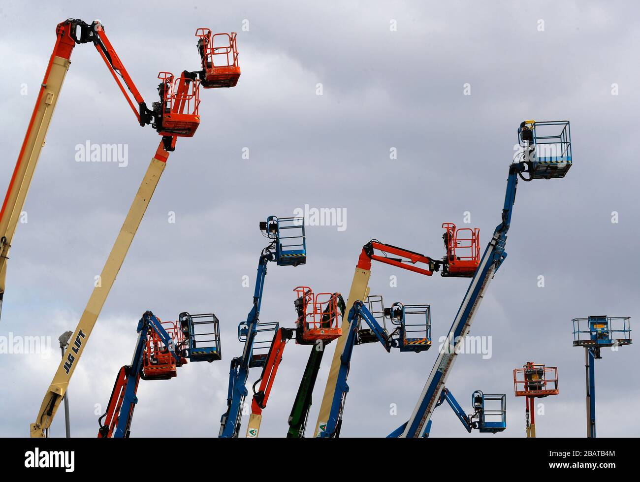 Nottingham, Nottinghamshire, UK. 29th March 2020. Cherry pickers stand in the yard of the A-Plant tool and equipment hire company in Nottingham. Credi Stock Photo