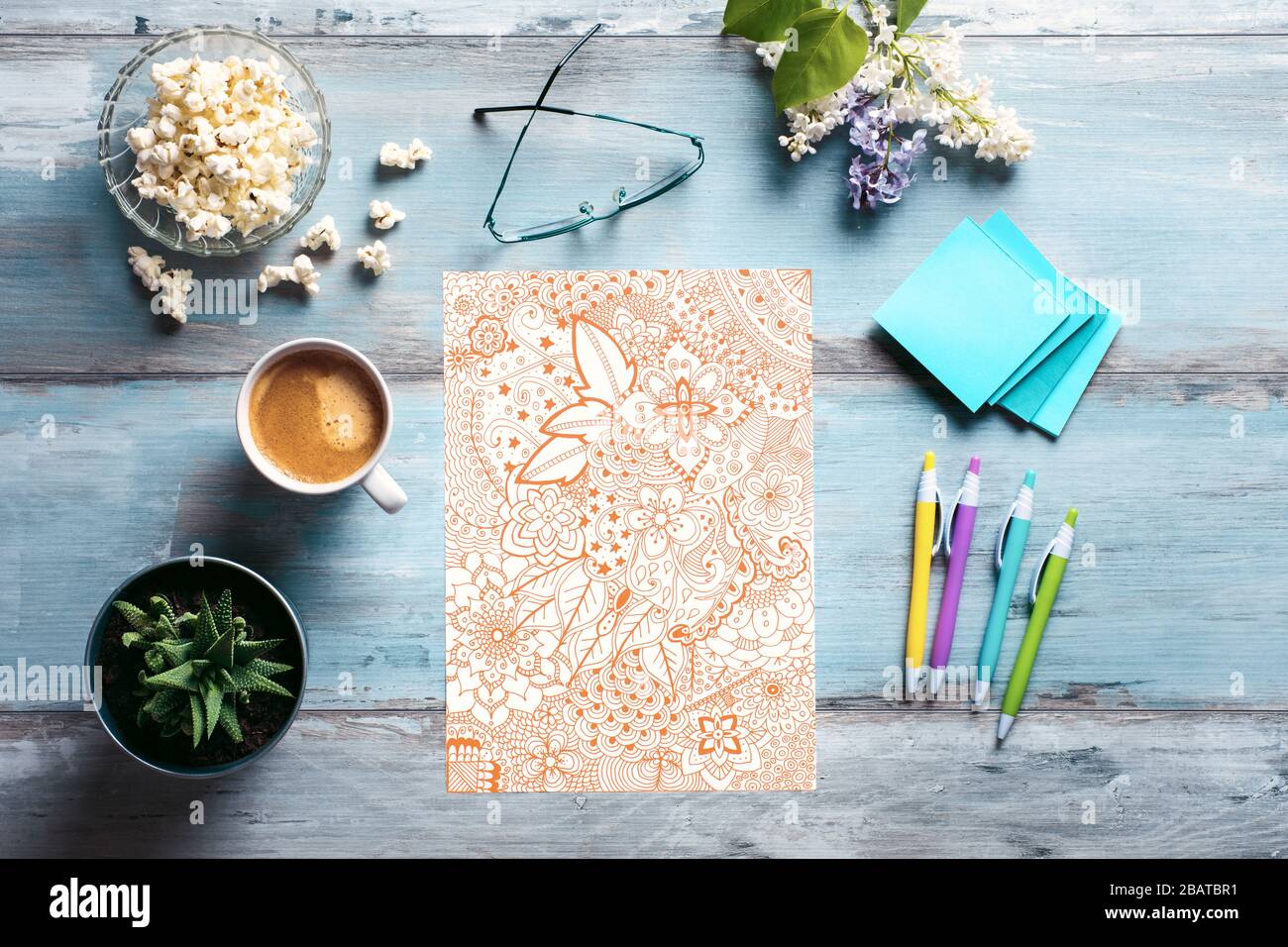 Adult coloring book, stress relieving trend. Flat lay art therapy, mental health, creativity and mindfulness concept. Stock Photo