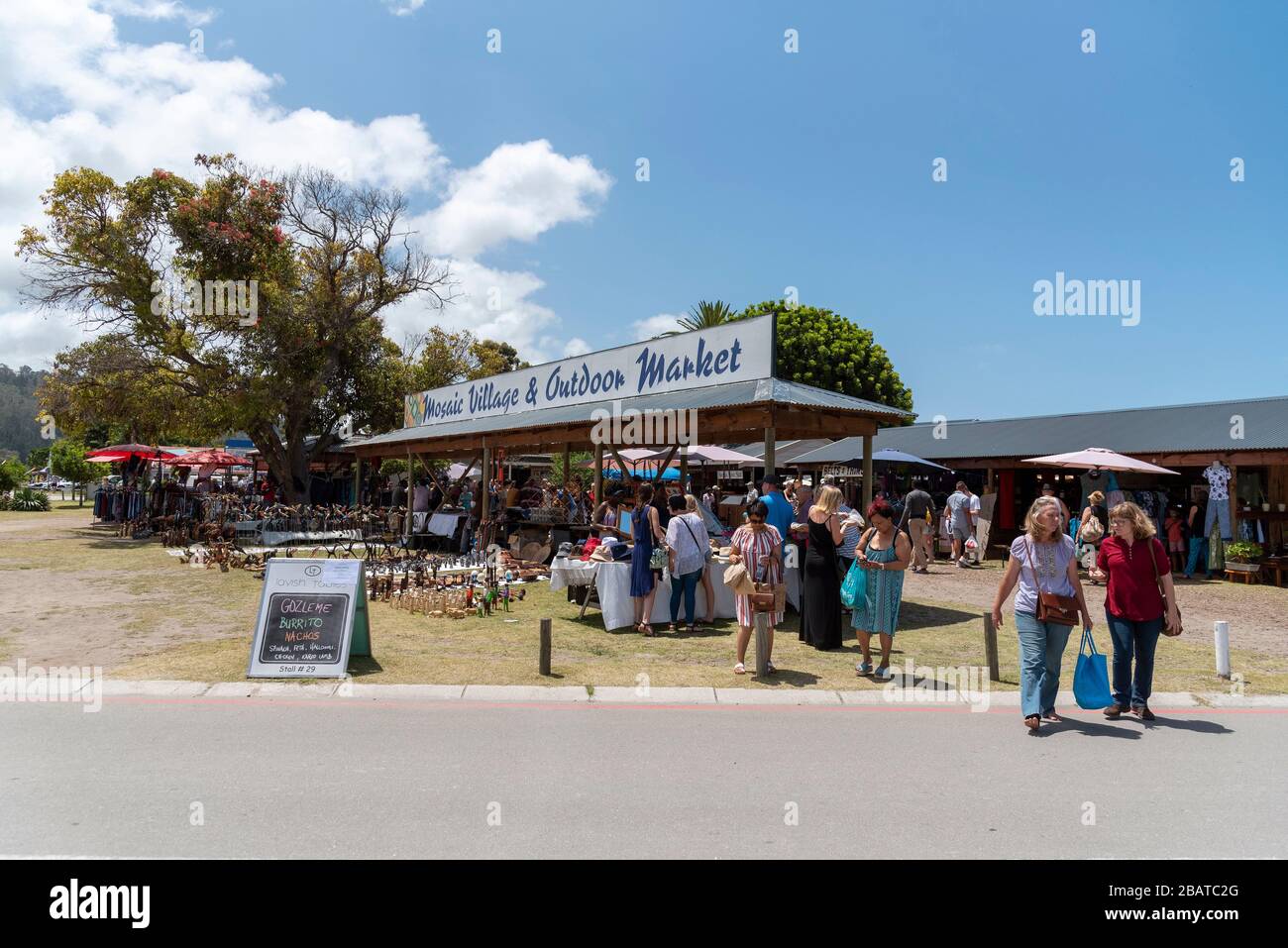Sedgefield, Knysna, Western Cape, South Africa. Dec 2019. Visitors to the Saturday market in Sedgefield on the Garden Route, near Knysna, Western Cape Stock Photo