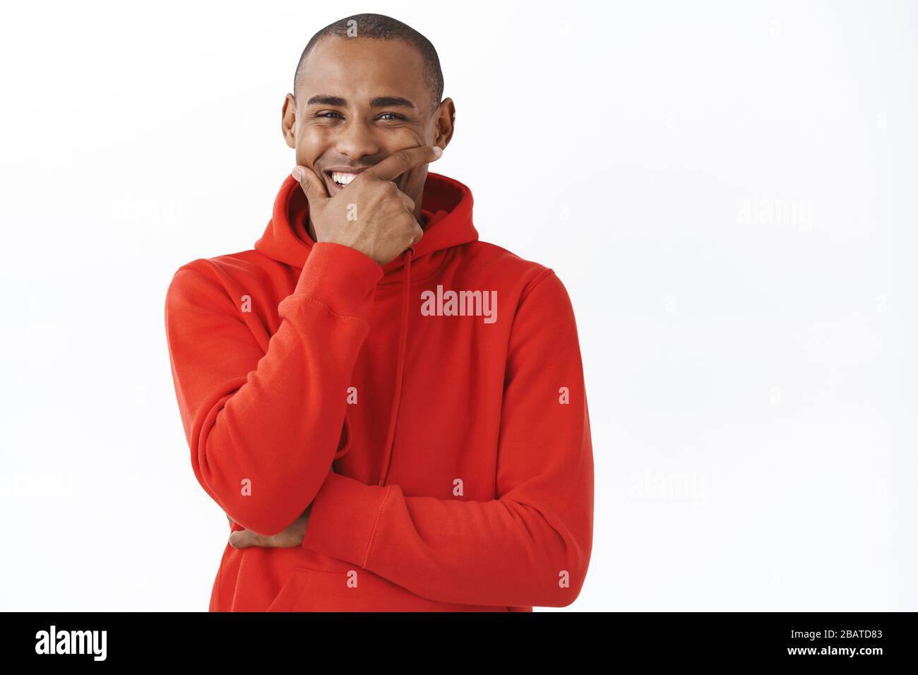 Close-up portrait of carefree, happy african-american man, laughing and  smiling, having conversation with friend, watching funny movie or comedy  show Stock Photo - Alamy