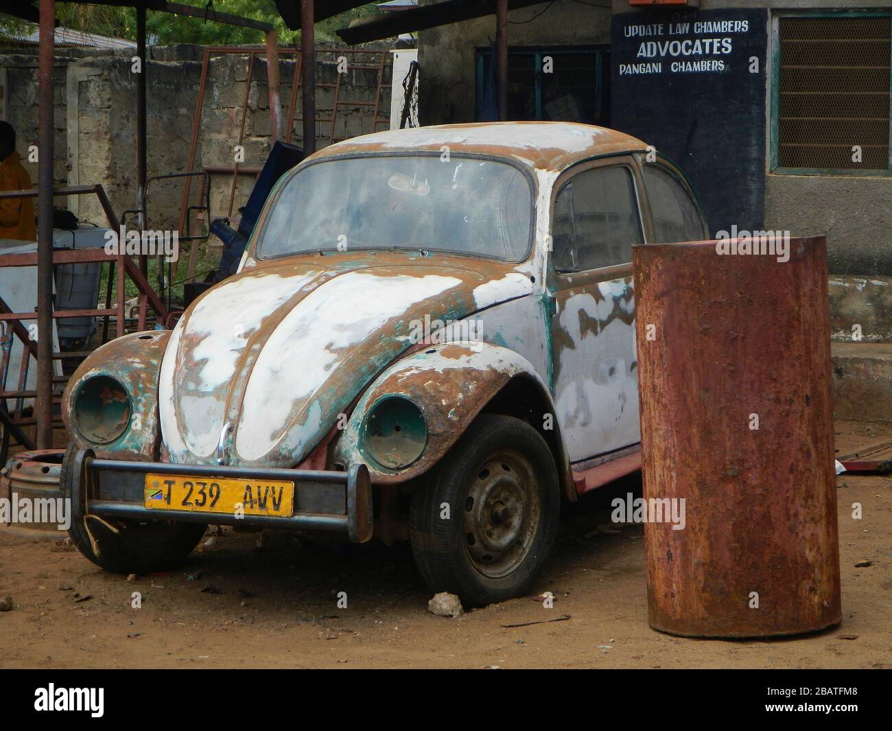 An old VW Beatle vehicle in a remote village in Tanzania, still running
