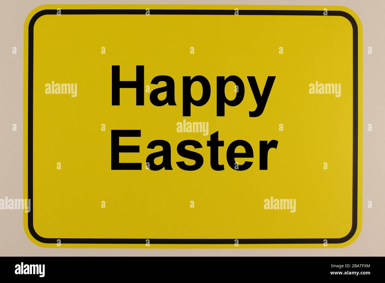 Illustration eines Ortseingangsschildes mit dem Schriftzug 'Frohe Ostern' Stock Photo