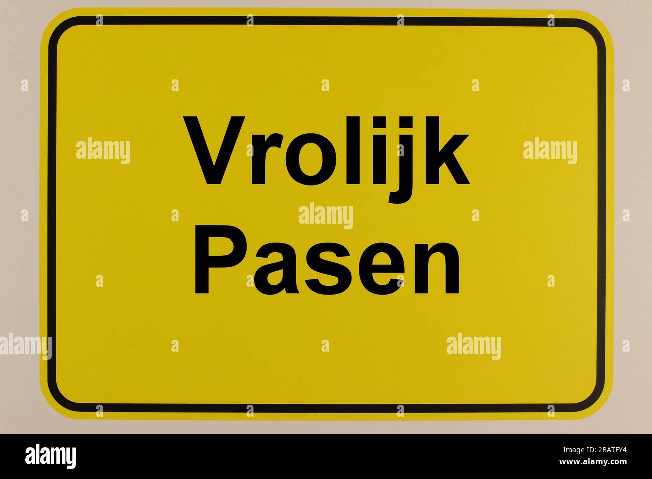Illustration eines Ortseingangsschildes mit dem Schriftzug 'Frohe Ostern' Stock Photo