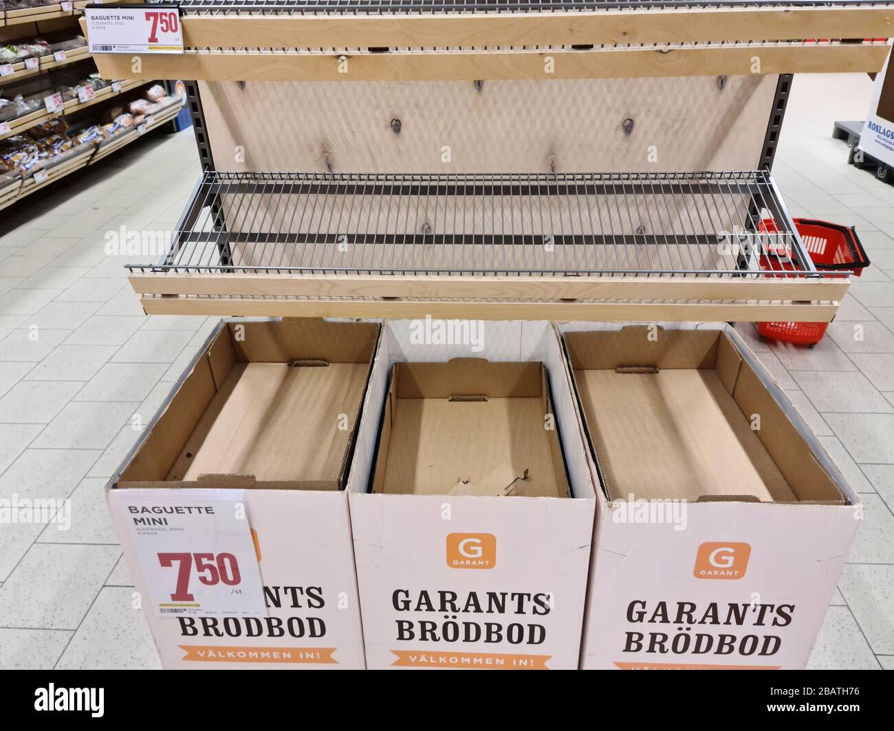 Almost empty shelves in store because of panic around coronavirus