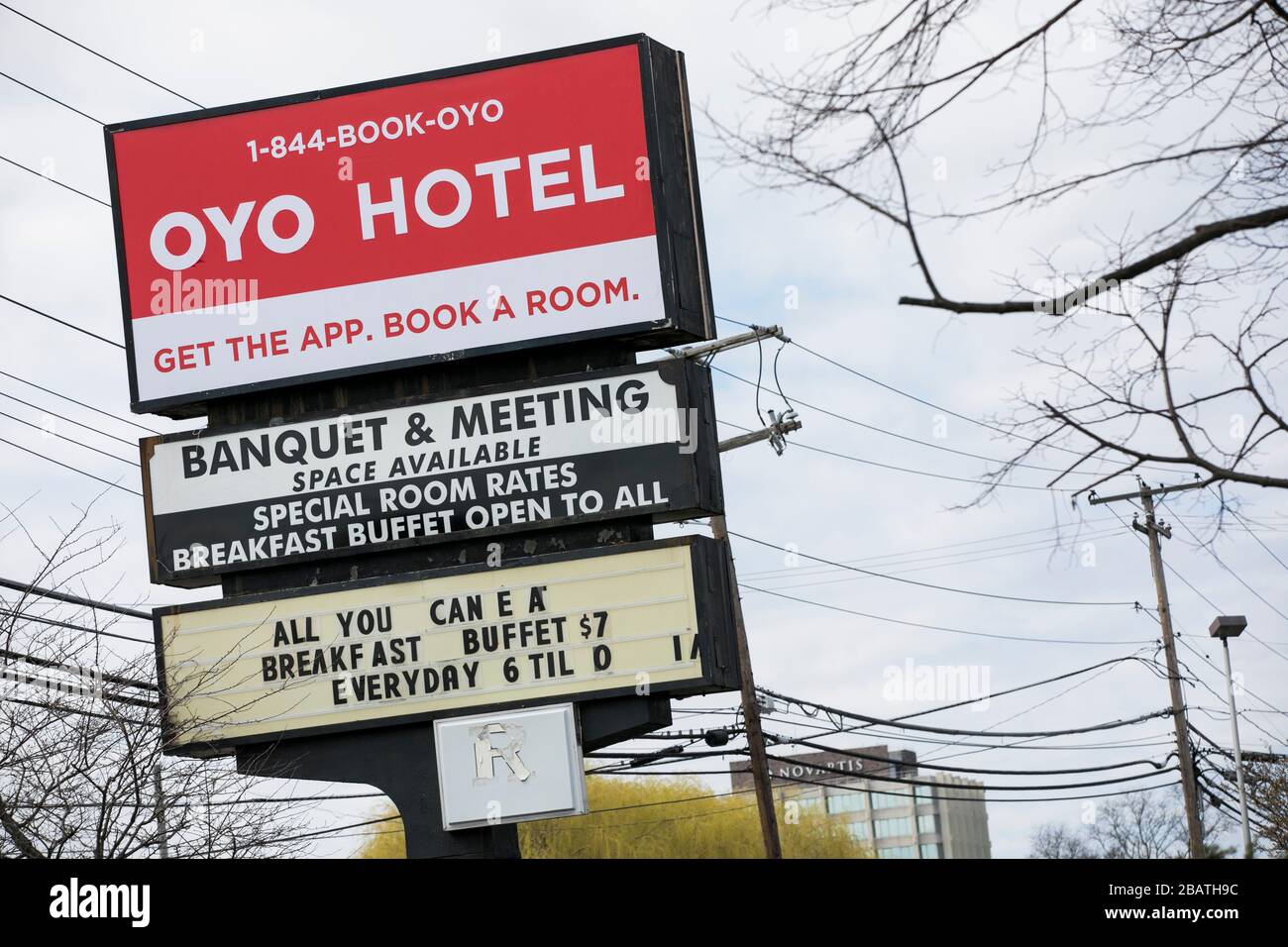 A logo sign outside of a Oyo Rooms Hotel in East Hanover, New Jersey, on March 23, 2020. Stock Photo