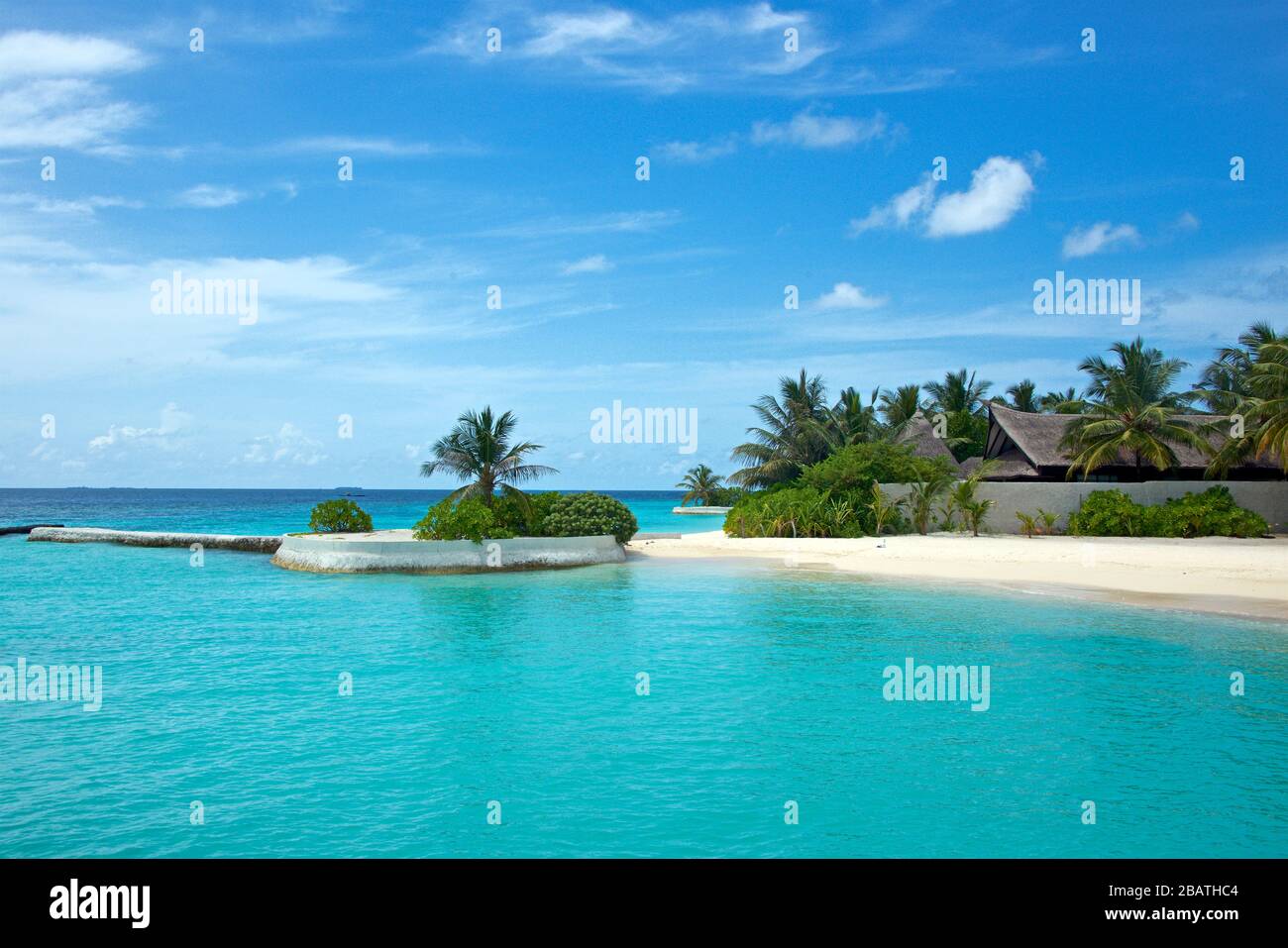 Beach and turquoise water Resort South Male Atoll Maldives Stock Photo