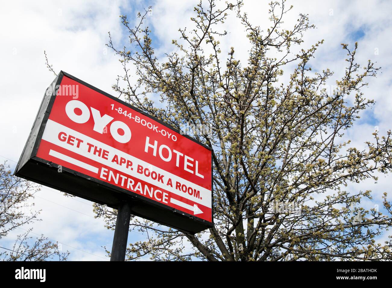 A logo sign outside of a Oyo Rooms Hotel in East Hanover, New Jersey, on March 23, 2020. Stock Photo