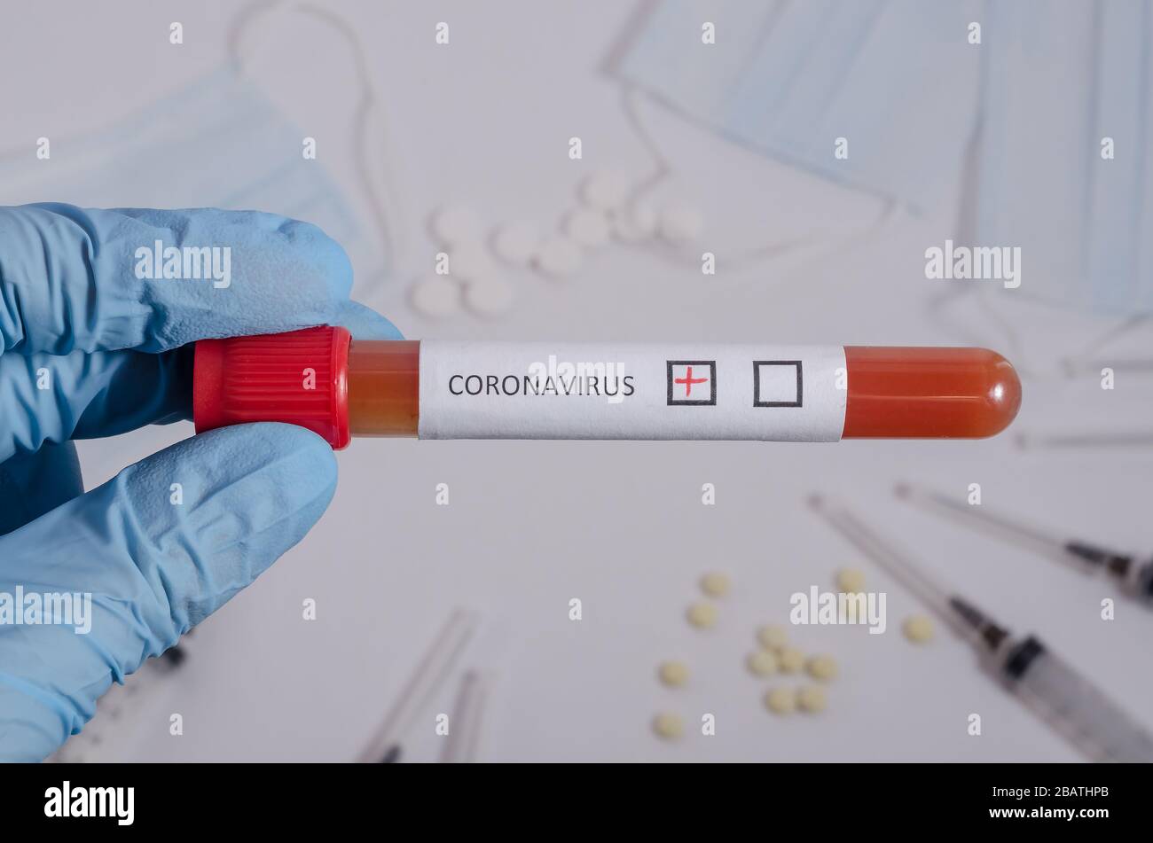 Positive blood test for coronavirus, surgical medical mask and