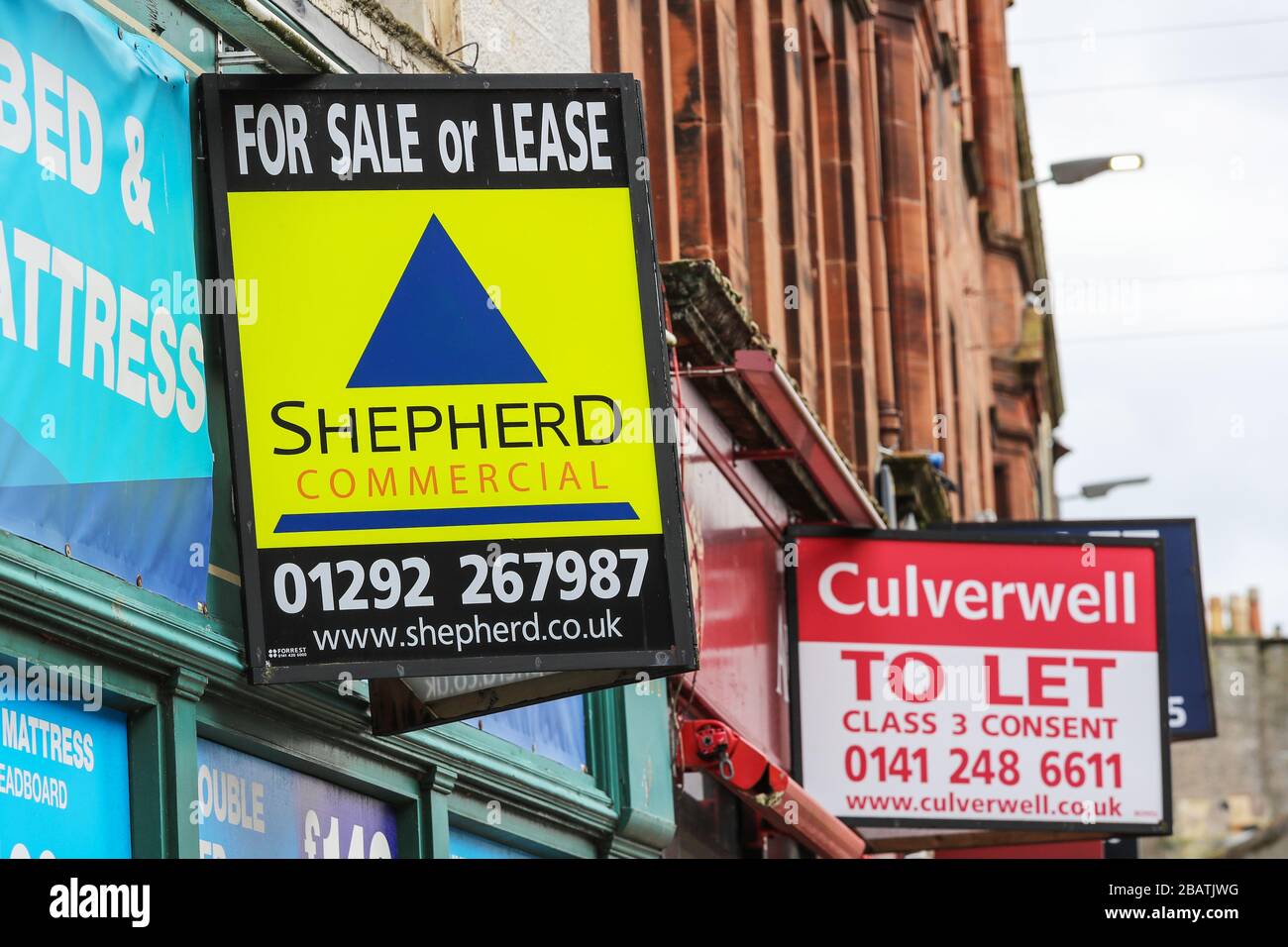 Property sale boarding outside shop premises that have gone out of