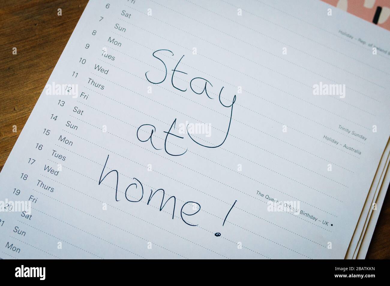 Coronavirus covid19 lockdown quarantine. Stay at home. Calendar showing a blank month with the words 'stay at home' written Stock Photo