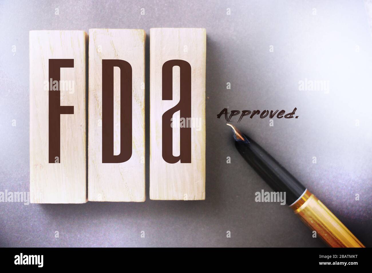 FDA approved words made with wooden blocks. Food and drugs association concept Stock Photo