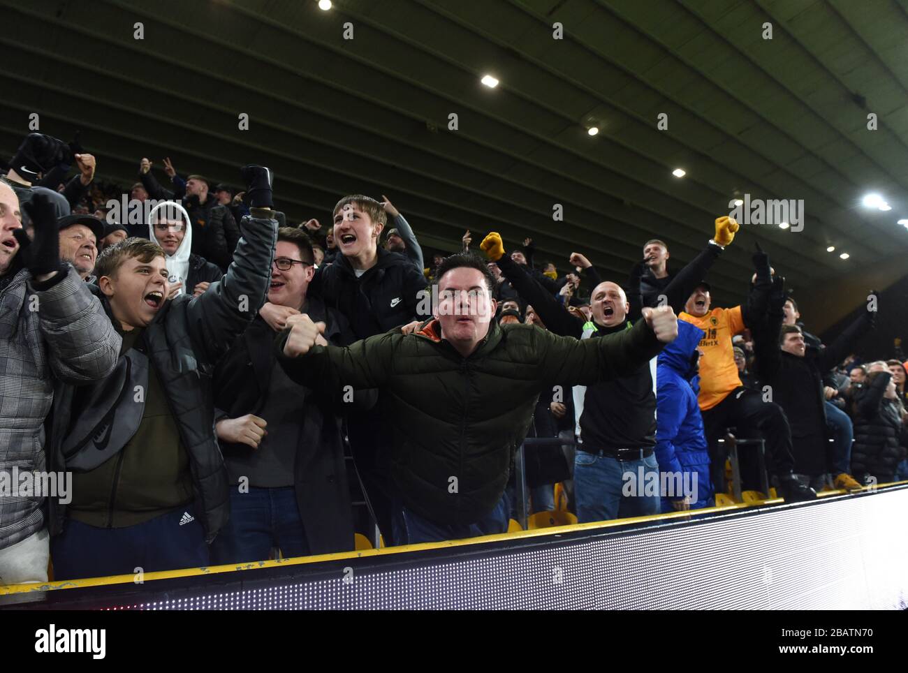 Celebrating football supporters fans of Wolverhampton Wanderers Stock Photo