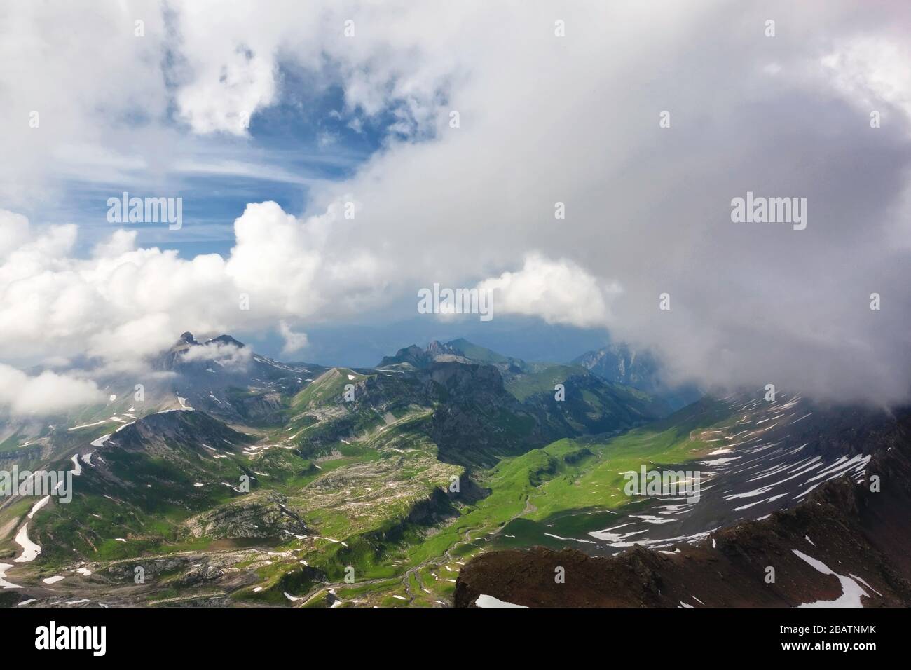 Snow and meadows at the summit of Schilthorn, Jungfrau region, Bernese Oberland, Switzerland, Europe, color Stock Photo