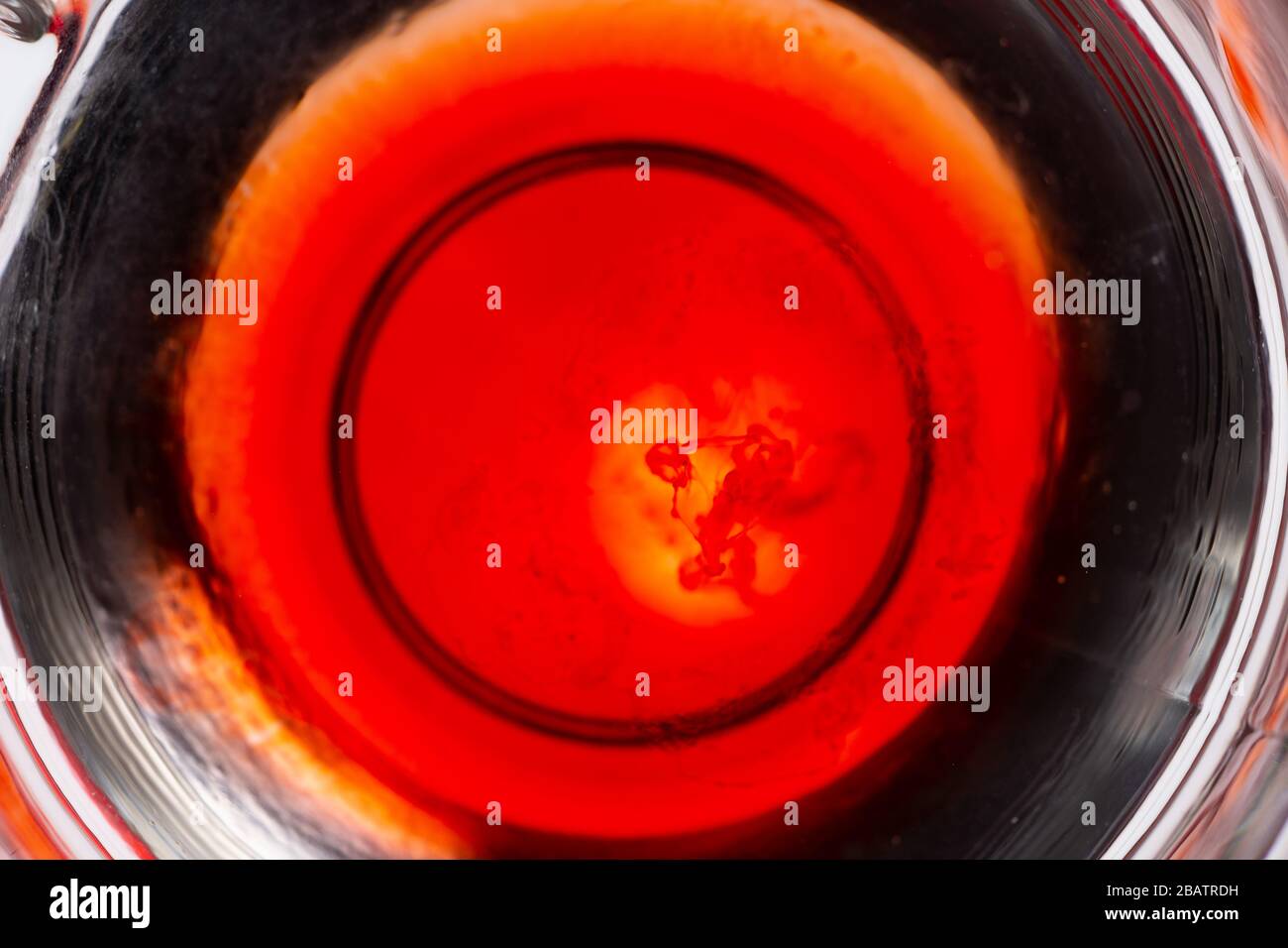Image of bloodcolored liquids mixed with other organic fluids