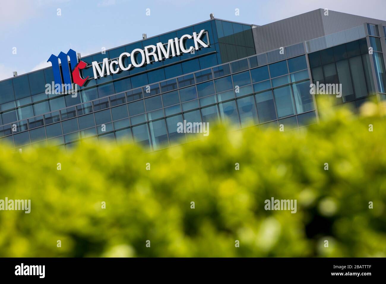 A logo sign outside of the headquarters of McCormick & Company in Hunt