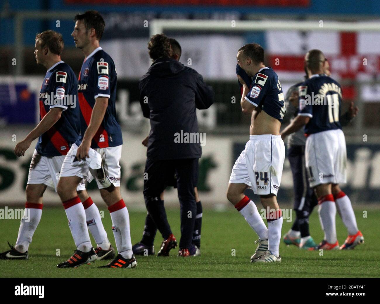 Carlisle United's Chris Chantler (no 24) walks off dejected at the end of the match Stock Photo