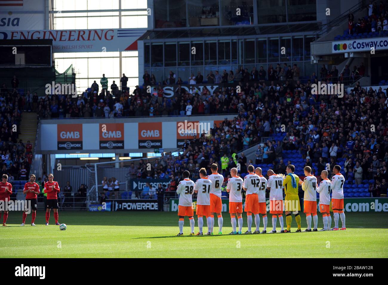 Blackpool's players observe a minutes applause for Jimmy Andrews Stock Photo