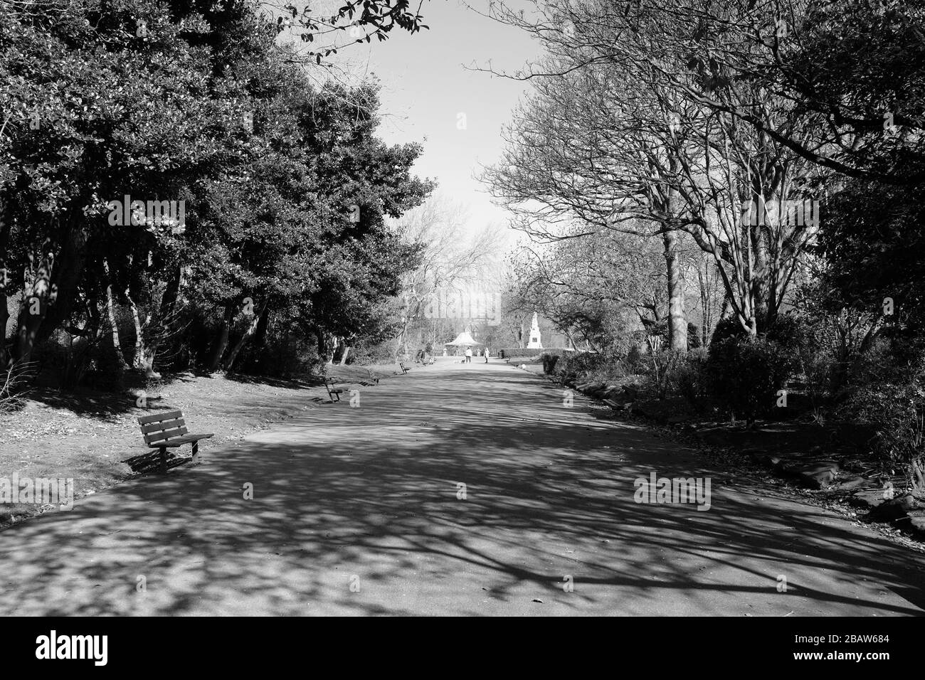 Derby Park in Bootle Liverpool is almost deserted and the children's play area closed. People keep their distance at the supermarket due to COVID-19. Stock Photo