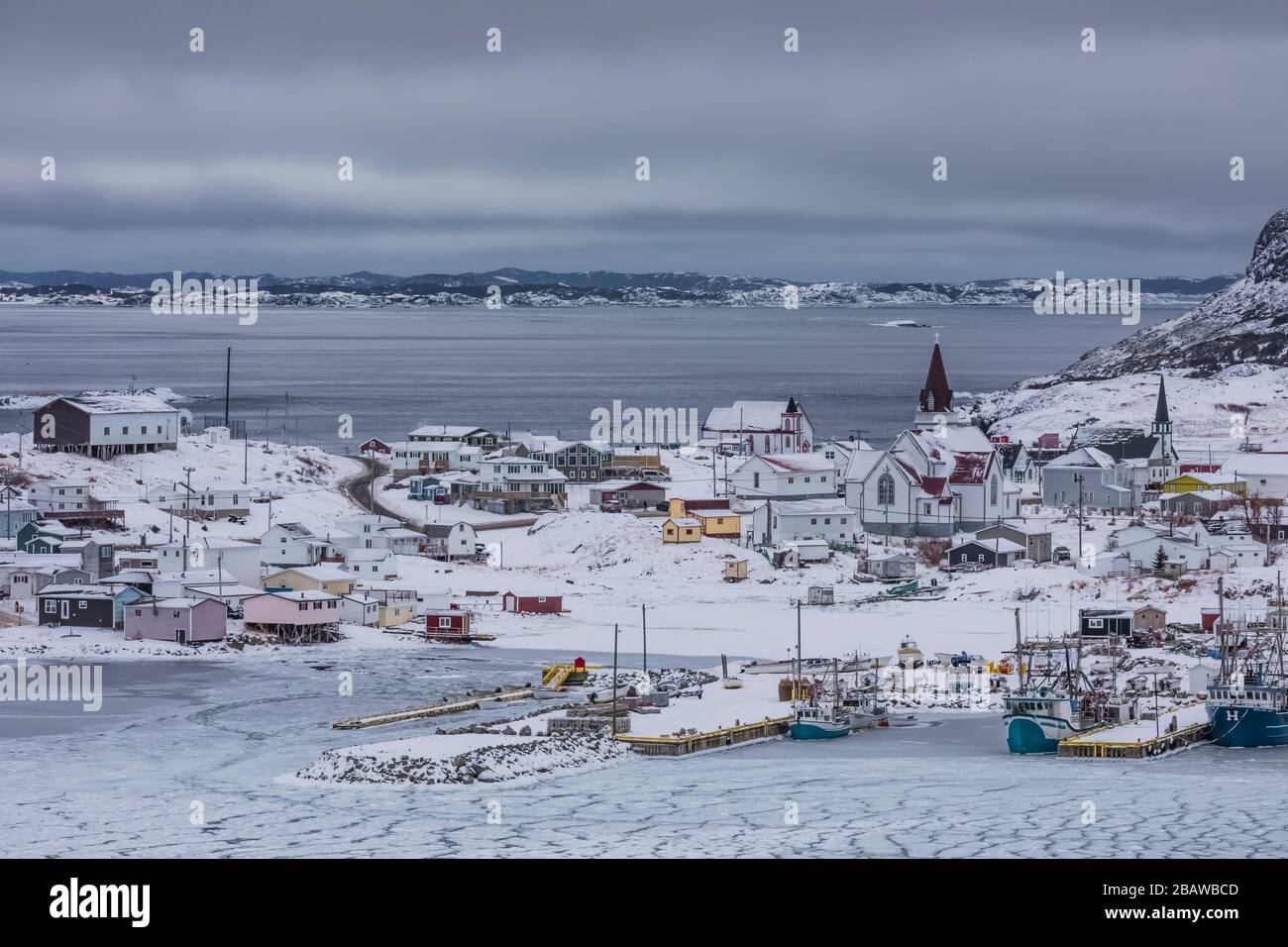 Looking across Seal Cove with winter pancake ice to the village of Fogo, on Fogo Island