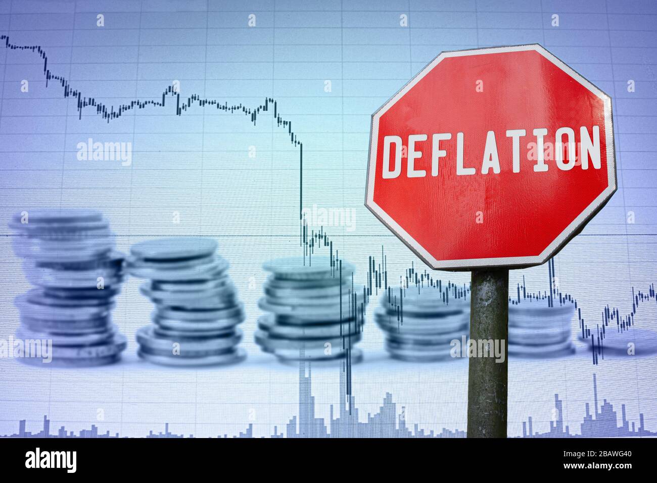Deflation sign on economy background - graph and coins. Financial crash in world economy because of coronavirus. Global economic crisis, recession. Stock Photo