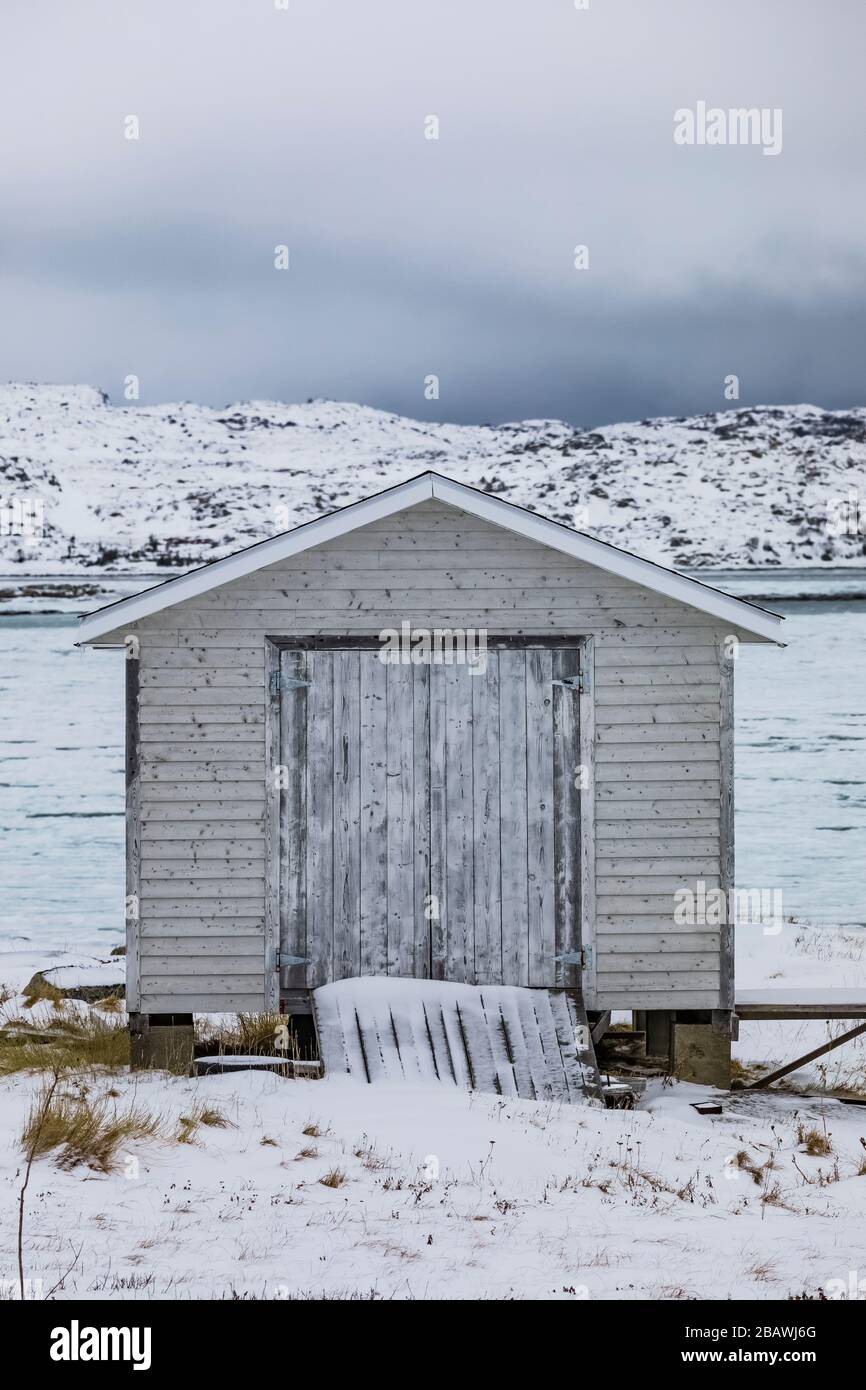 Stage on the waterfront of the village of Joe Batt's Arm, on Fogo island, Newfoundland, Canada {No property release; available for editorial licensing Stock Photo
