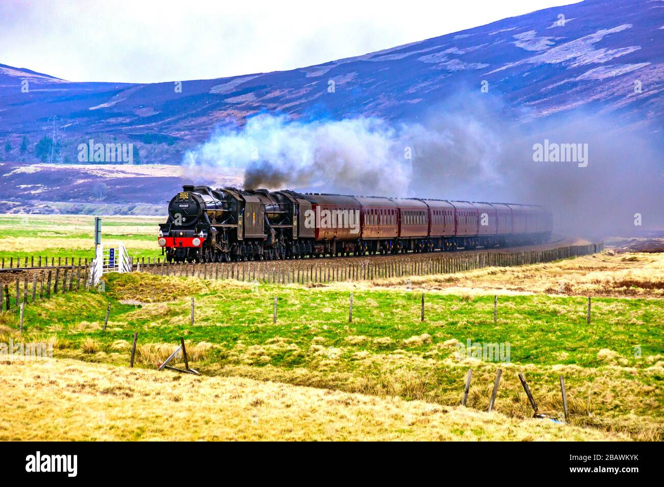 Double header with Black Five steam engines 45407 The Lancashire Fusillier and 44871 heading towards Dalwhinnie on the highland main line in Scotland Stock Photo