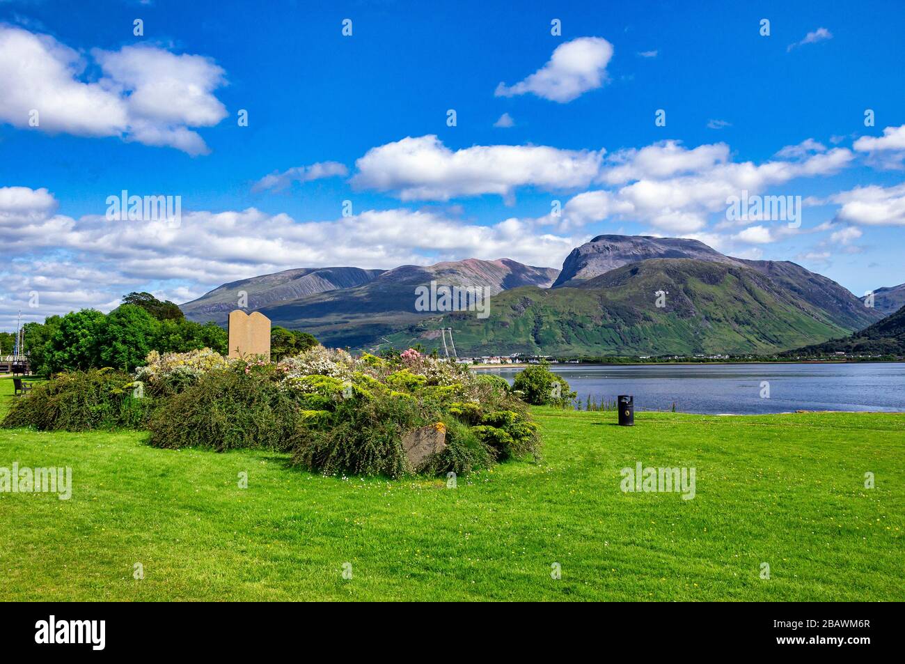 Colourful summer view of Scotland's highest mountain Ben Nevis from the Caledonian Canal basin at Corpach near Fort William Highland Scotland Stock Photo