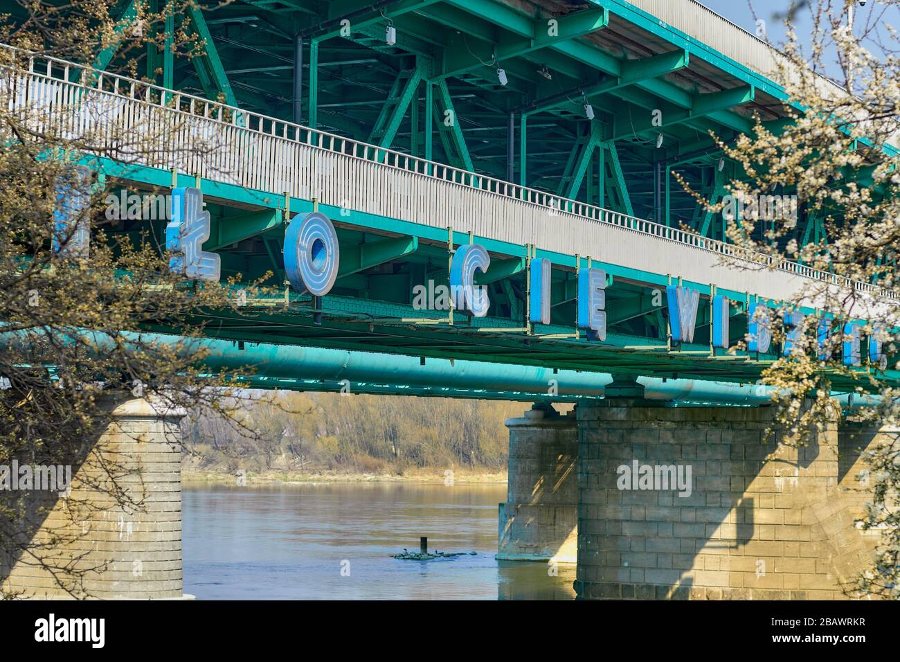 'Miło Cię Widzieć sentence sign on Sląsko Dąbrowski bridge in Warsaw, Poland. During covid times Stock Photo