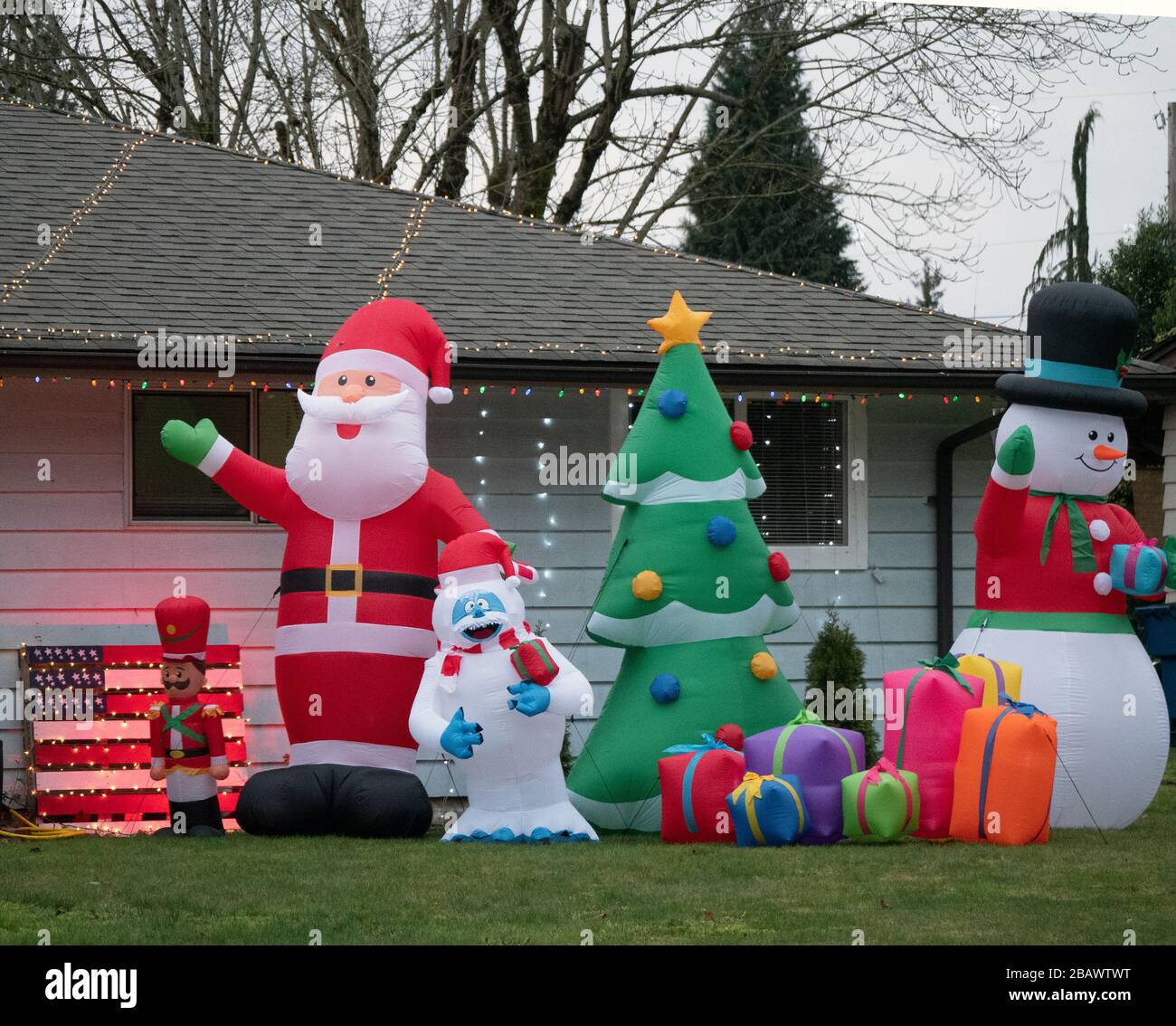 Blowup Christmas characters on a lawn. Stock Photo