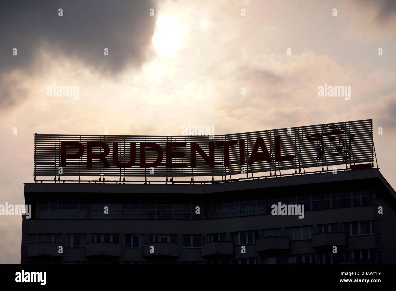 A sign advertising the Prudential insurance company is seen on top of a residential building in Warsaw, Poland on March 29, 2020. On March 24 the Polish government announced further restrictions on personal movement after already having closed schools, bars and restaurants in addition to closing the borders to foreigners. Gatherings of more than two people are banned in public until April 11. Despite stricter measures the ruling Law and Justice party has amended electoral rules so that the May 10 Presidential elections will stay in place. (Photo by Jaap Arriens/Sipa USA) Stock Photo