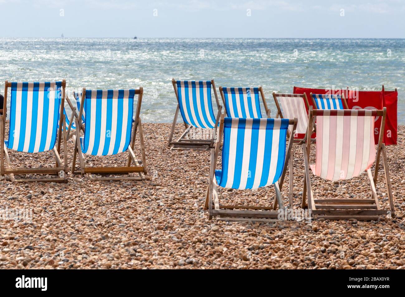 Striped fabric deck chairs hi-res stock photography and images - Alamy
