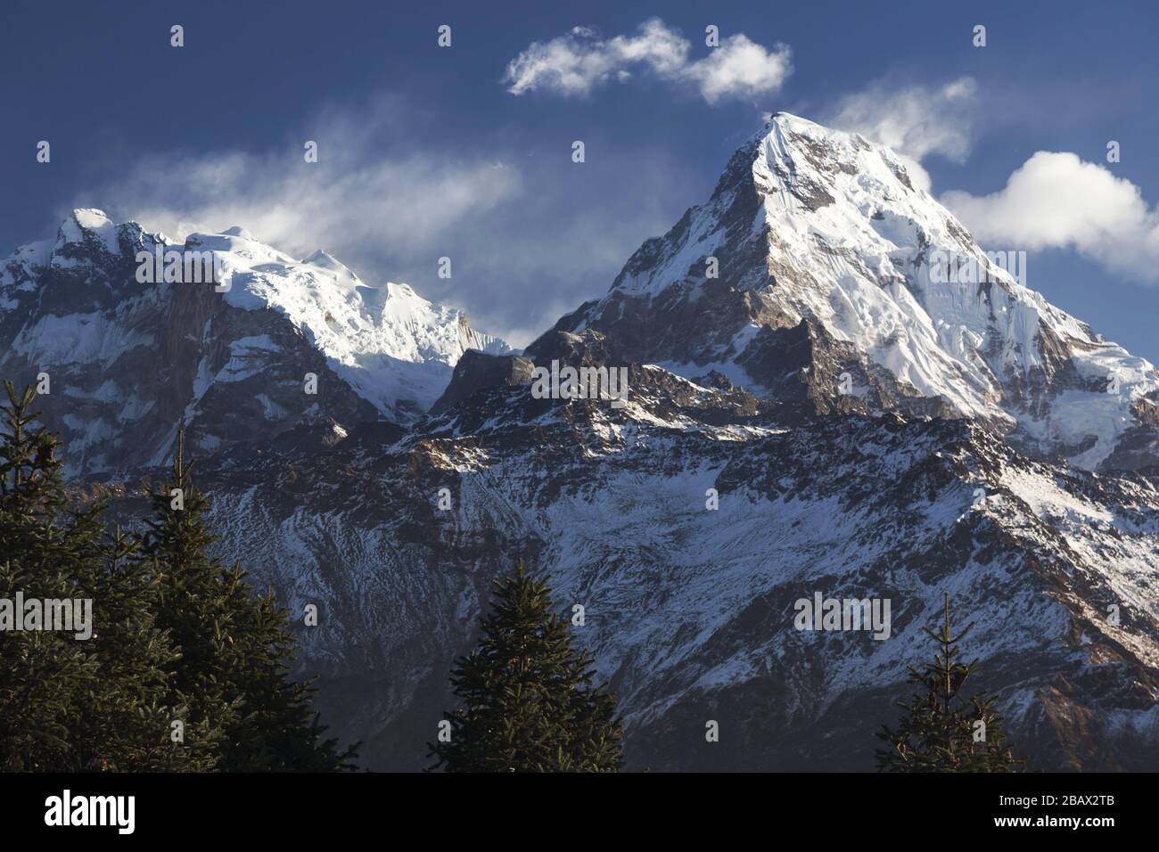 Scenic Early Morning Landscape View of Snowy Annapurna Mountain Peak Range from Poon Hill in Nepal Himalaya Mountains Stock Photo