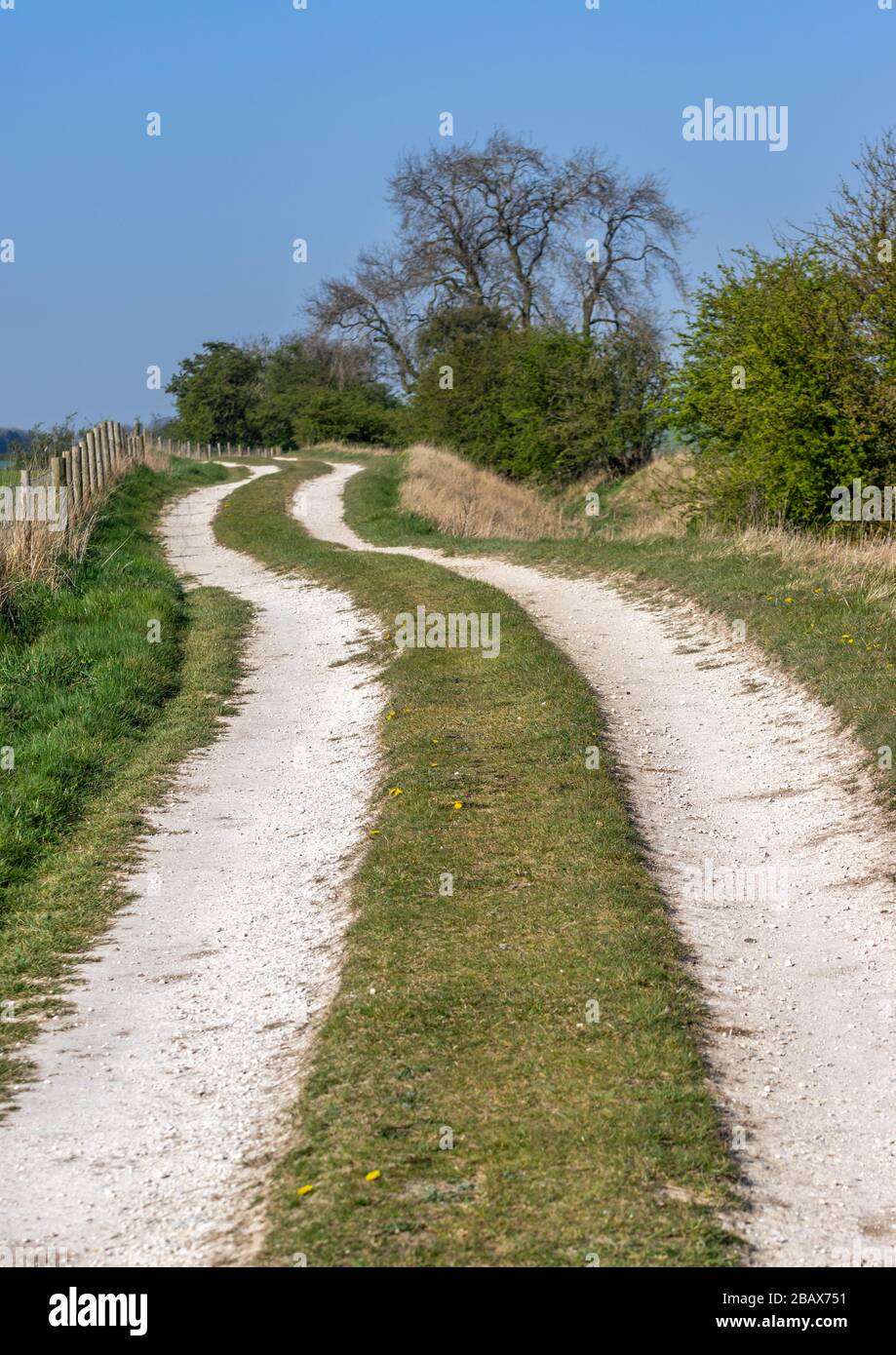 An undulation track of dirt leading to a farm in Frendal Dale in the Yorkshire Wolds. Stock Photo