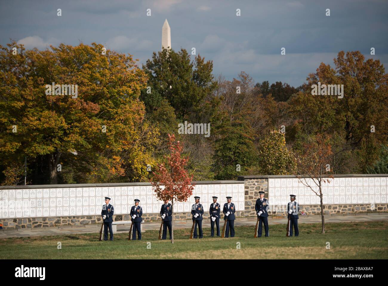 'Members of the U.S. Air Force participate in the graveside service for U.S. Air Force Maj. Candice Ismirle, Nov. 9, 2016, in Arlington, Va. She was buried in Section 76 of Arlington National Cemetery. (U.S. Army photo by Rachel Larue/Arlington National Cemetery/released); 9 November 2016, 14:32; Graveside service for U.S. Air Force Maj. Candice Ismirle; Arlington National Cemetery; ' Stock Photo