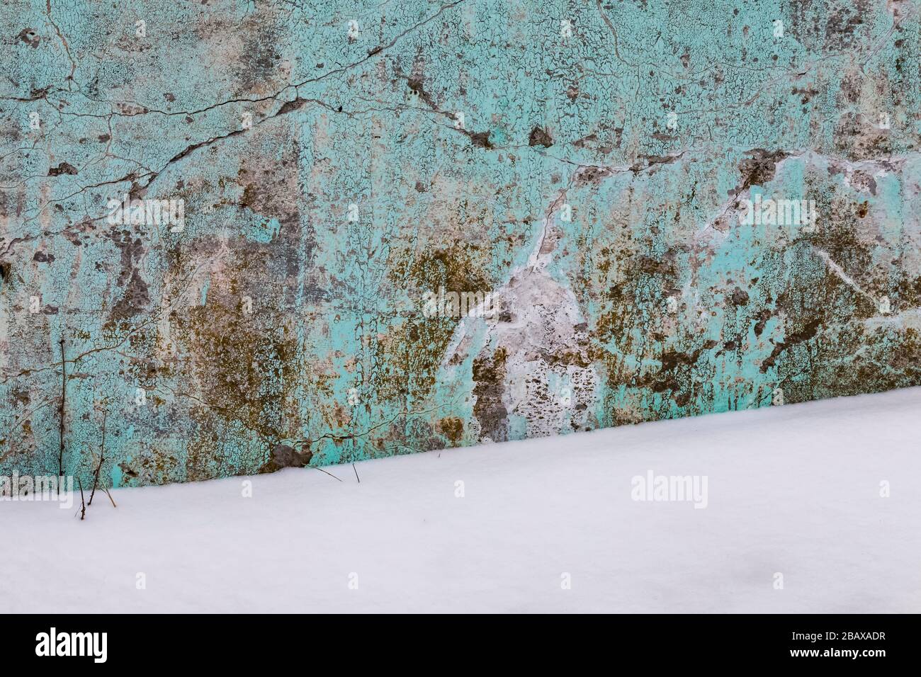 Painted and weathered concrete foundation in Joe Batt's Arm, Fogo