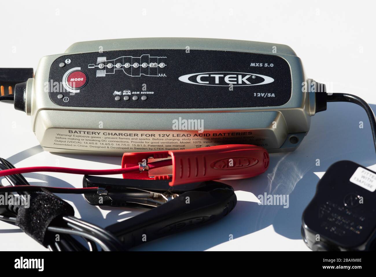 A modern microprocessorcontrolled vehicle battery charger Stock Photo