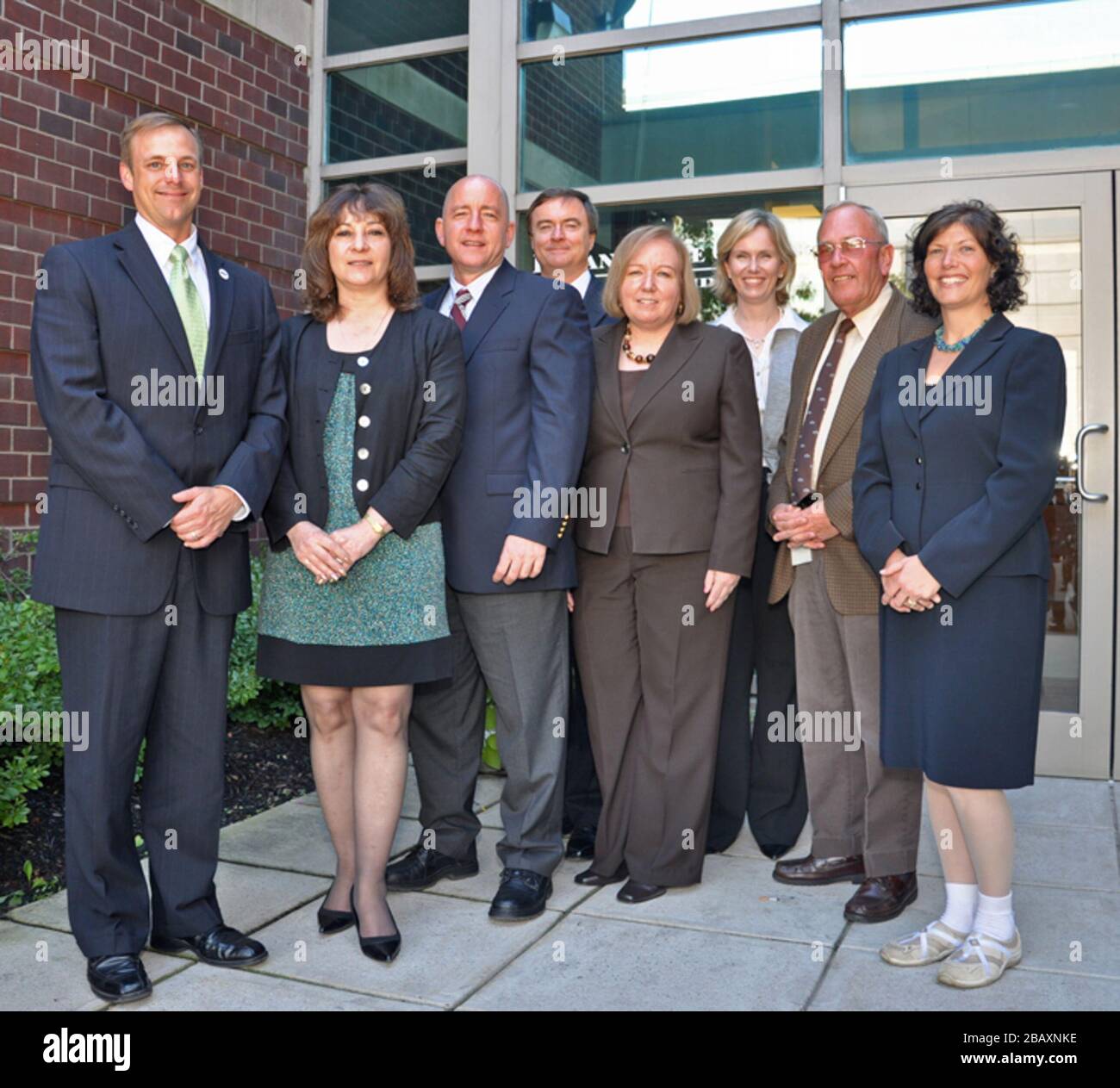 'MassDOT Aeronautics Division staff members assemble at their new offices.  Division Administrator Christopher J. Willenborg is at left.; 21 September 2009, 01:24; MassDOT Aeronautics Division, September 2009; MassDOT; ' Stock Photo