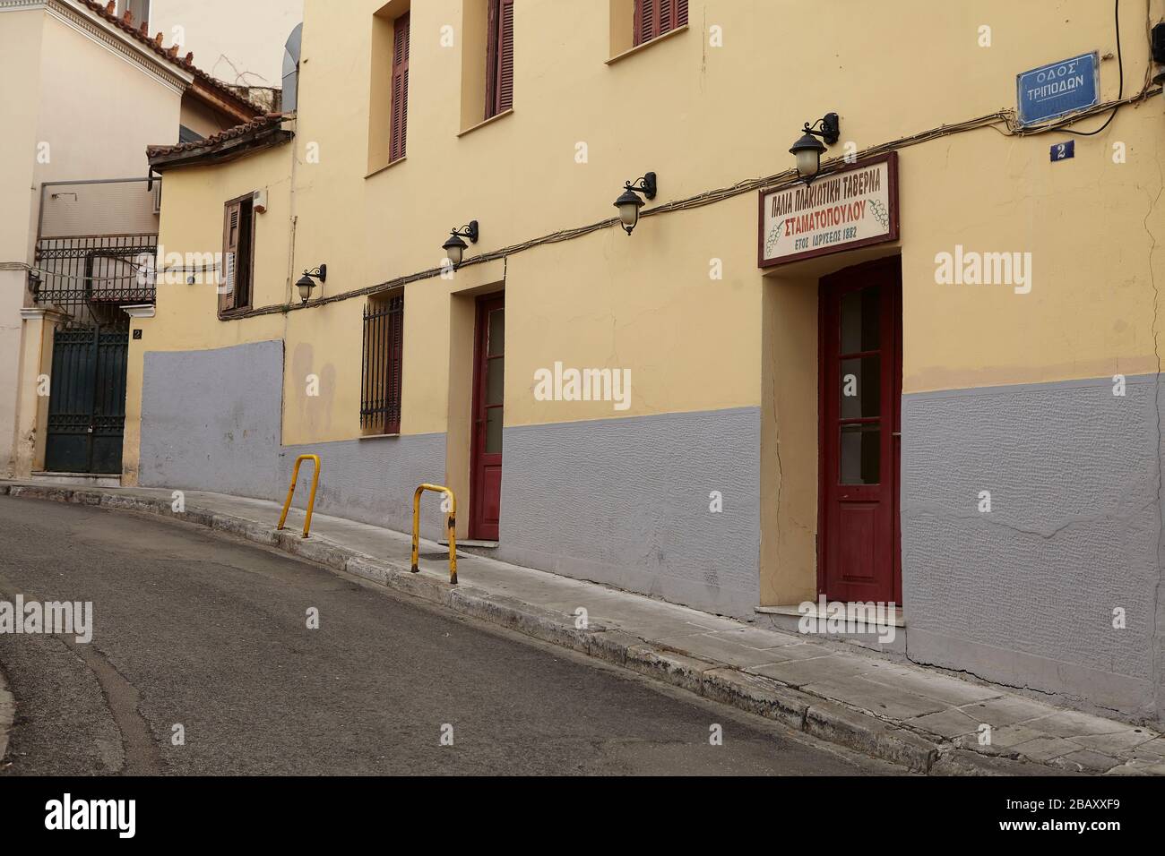plaka Athens, empty street in front of a tavern, coronavirus Stock Photo