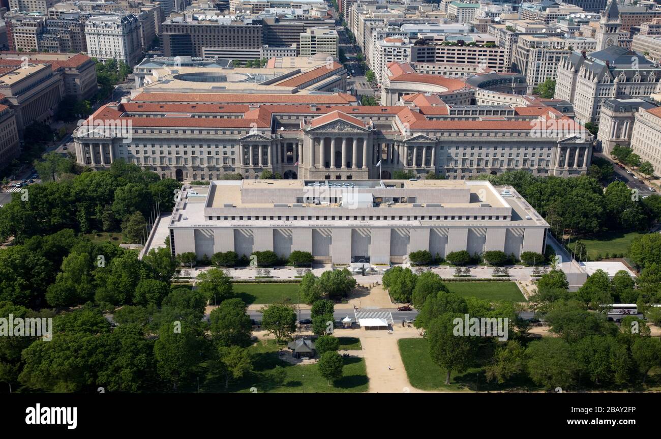 'English: Aerial view of the National Museum of American History, located on the National Mall in Washington, D.C.  The Andrew W. Mellon Auditorium, among other buildings in the Federal Triangle, is visible in the background.; 5 May 2008; This image  is available from the United States Library of Congress's Prints and Photographs division under the digital ID highsm.04970.This tag does not indicate the copyright status of the attached work. A normal copyright tag is still required. See Commons:Licensing for more information.   العربية | беларуская (тарашкевіца) | čeština | Deutsch | English | Stock Photo