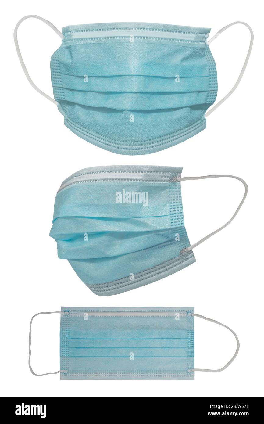 Surgical mask with rubber ear straps. Typical 3-ply surgical mask to cover the mouth and nose. Procedure mask from bacteria. Protection concept. Stock Photo