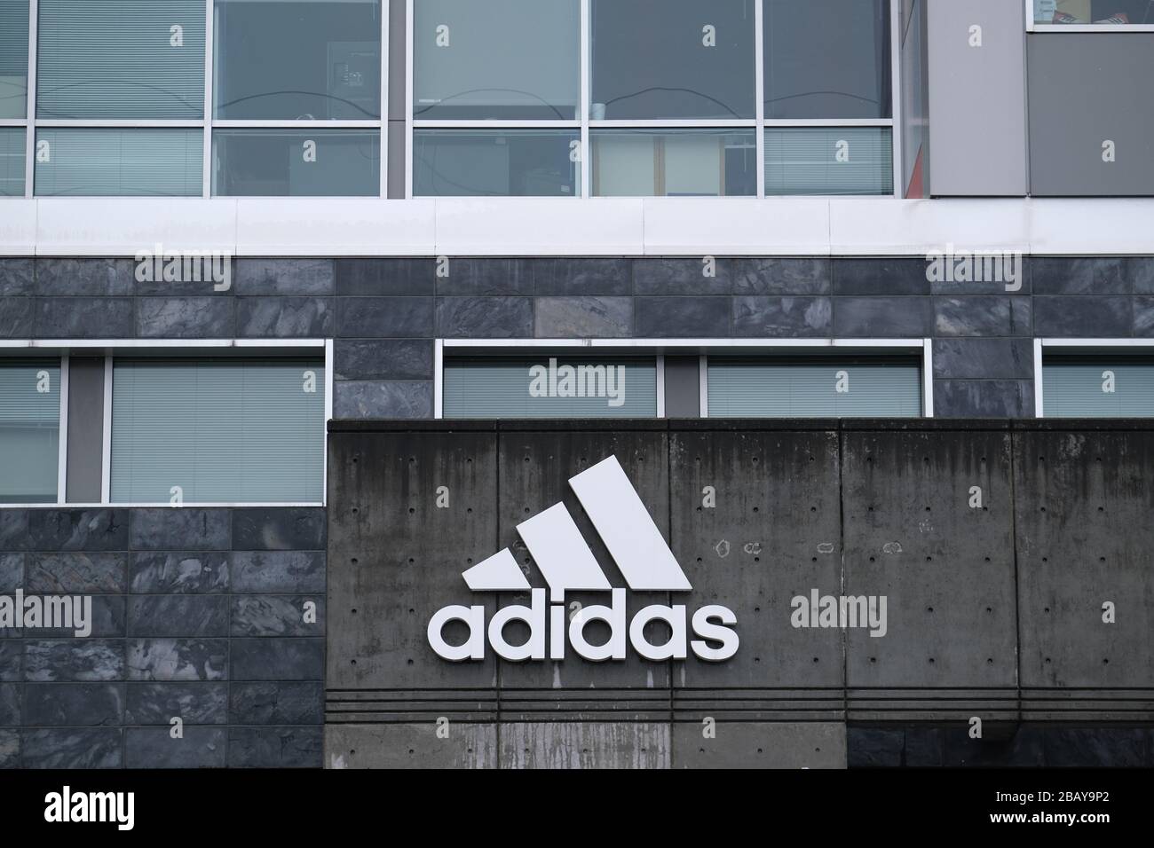 Portland, USA. 14th Mar, 2020. A logo is pictured on the Adidas North  American Headquarters in Portland, Ore., on March 14, 2020. The German shoe  company closed all stores in North America