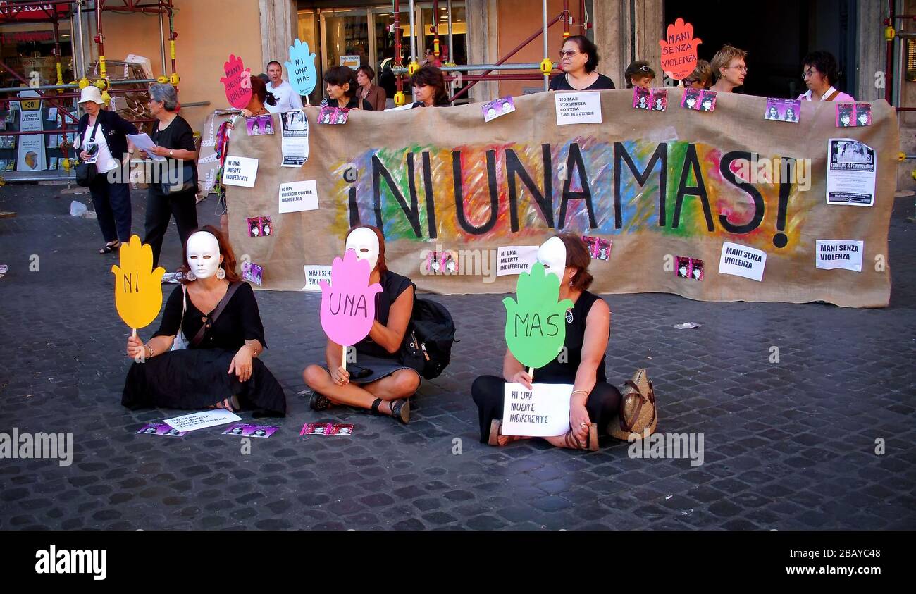 Street protest against domestic violence and killings, Largo di Torre Argentina, Rome, Lazio, Italy, Europe, color Stock Photo