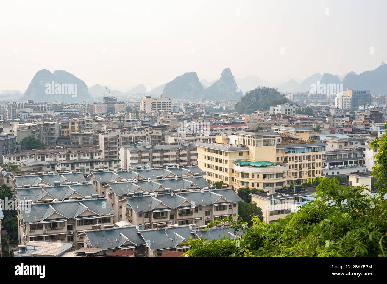 Guilin, Guangxi province, China - Nov 6, 2019 : Guilin hills and city landscape aerial view in the haze Stock Photo